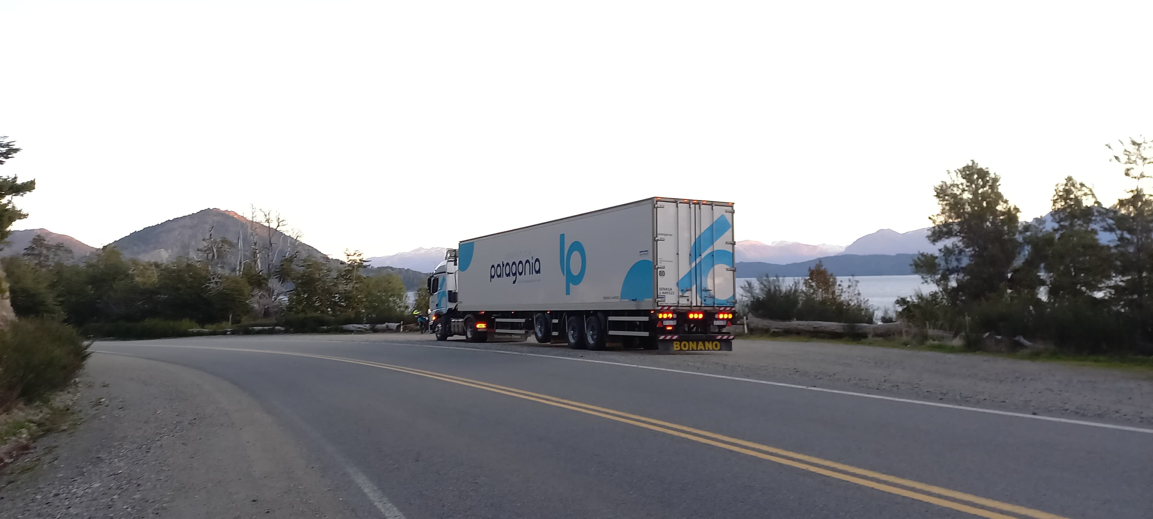 Logística Patagonia truck with lake view